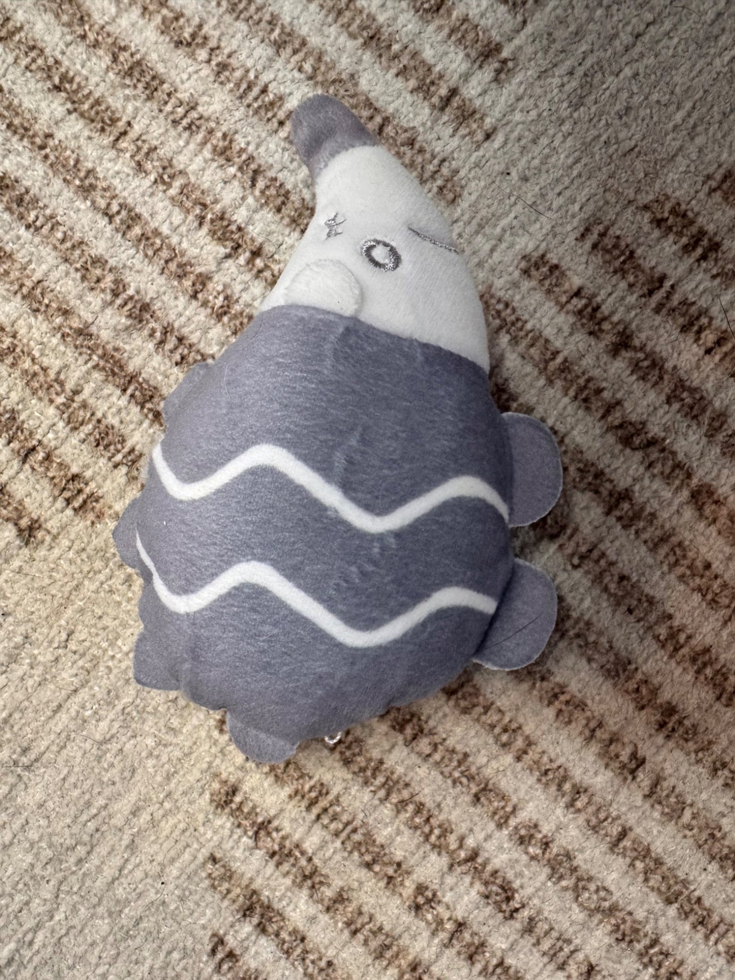 3 baby rattles and an Elephant Soother Holder