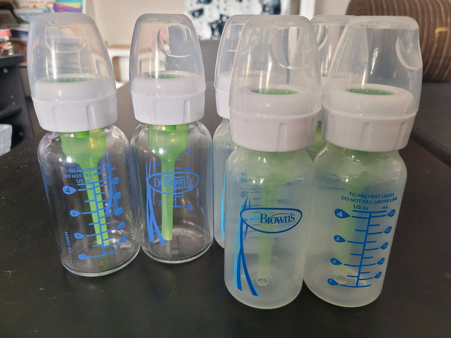 4 plastic and 2 glass Dr Browns natural flow bottles