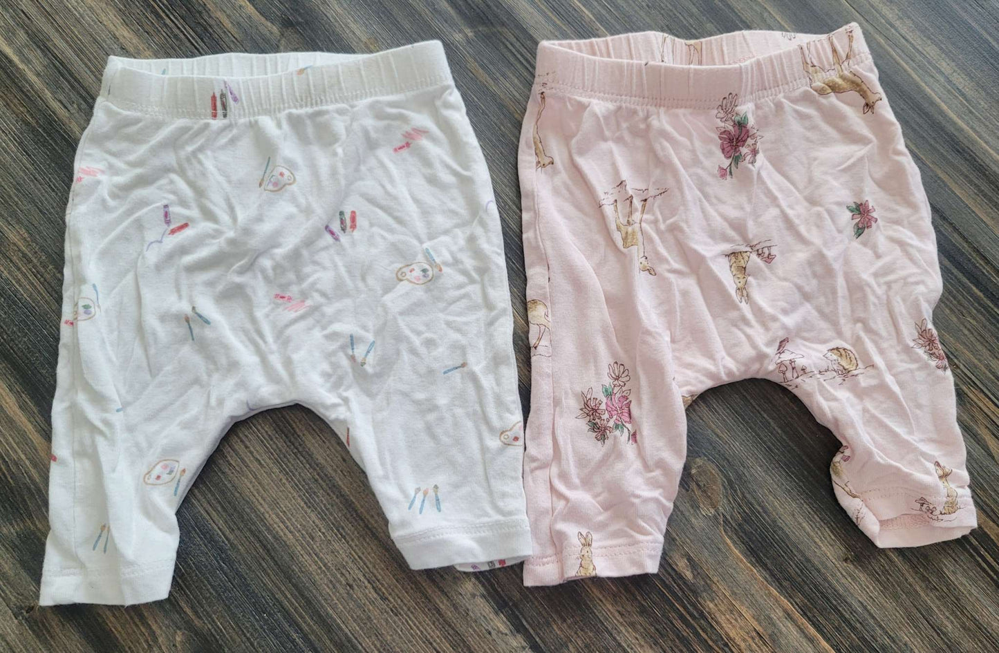 Two sets of Purely Soft pants, artist print and woodland animal print, newborn, Kids Newborn