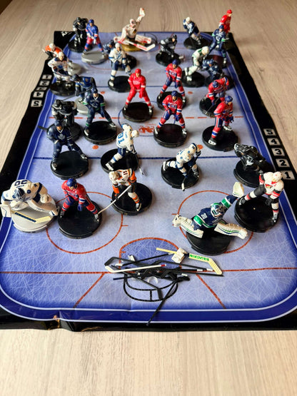 NHL figurines with sticks