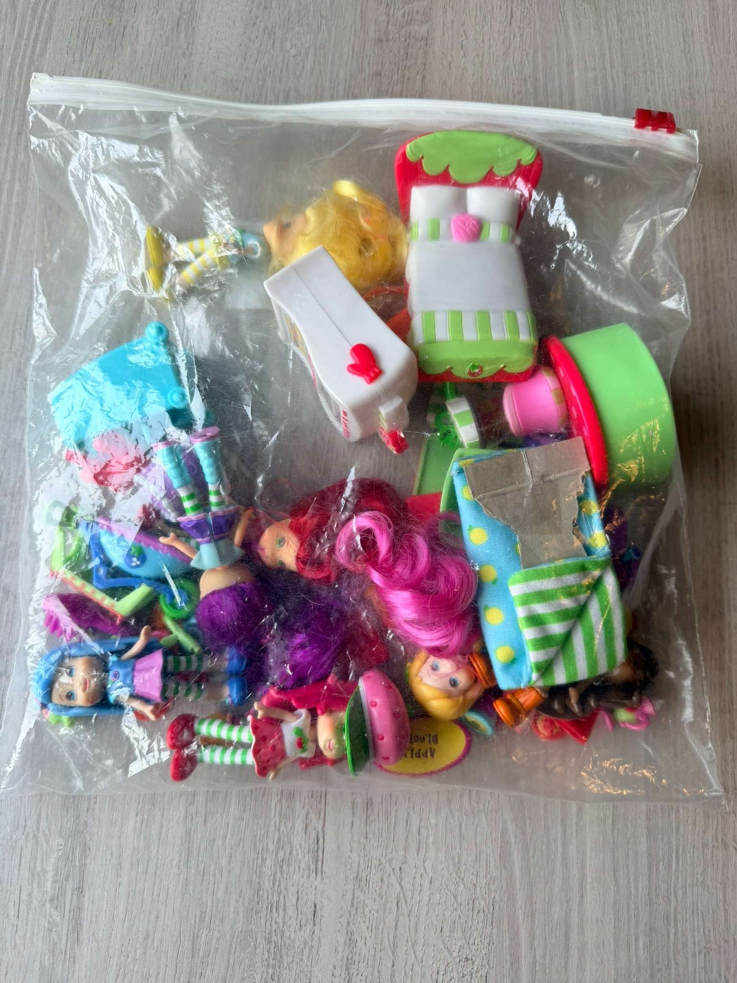 Strawberry Shortcake figurines and play pieces