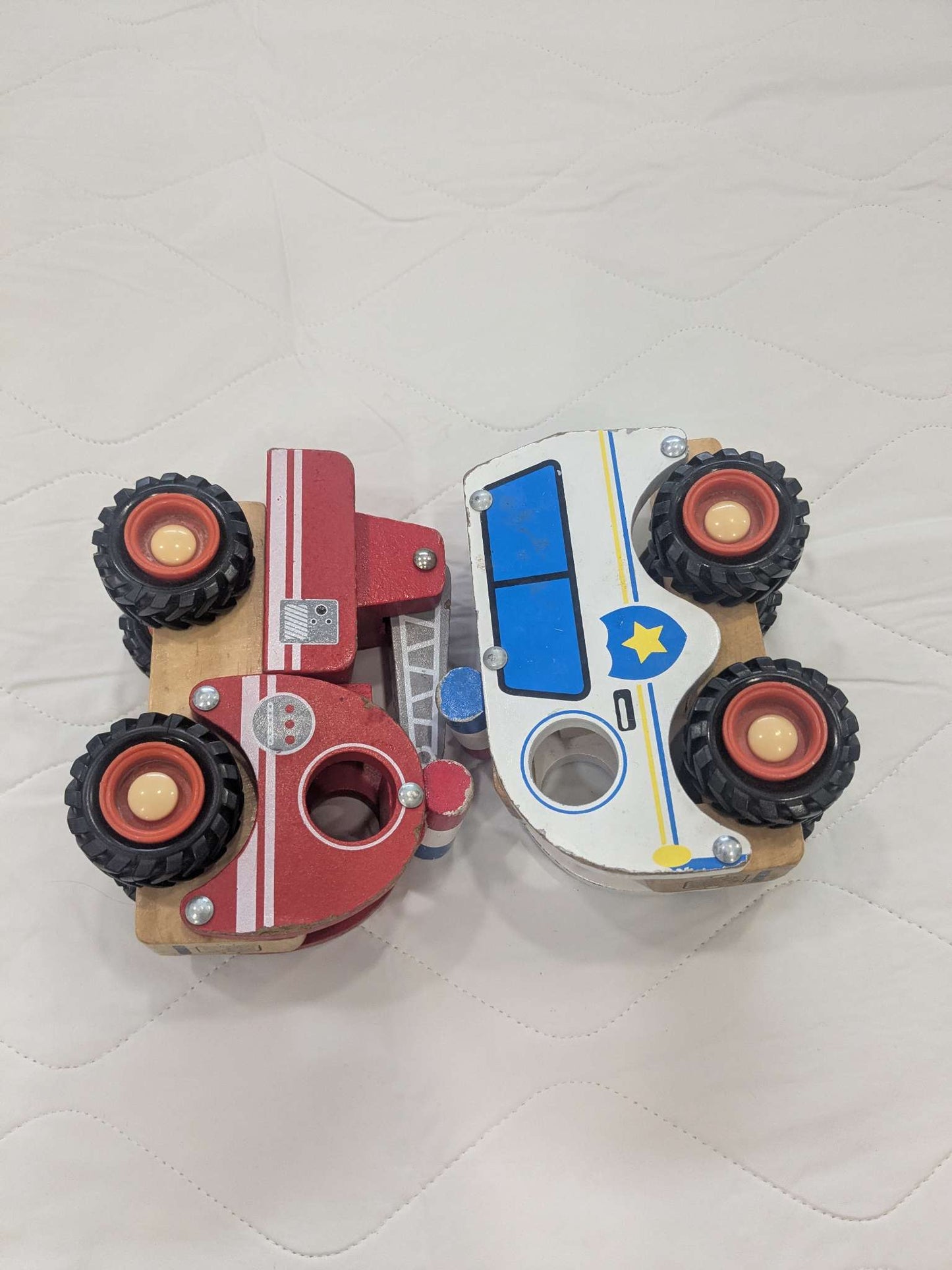 2x wooden emergency vehicles