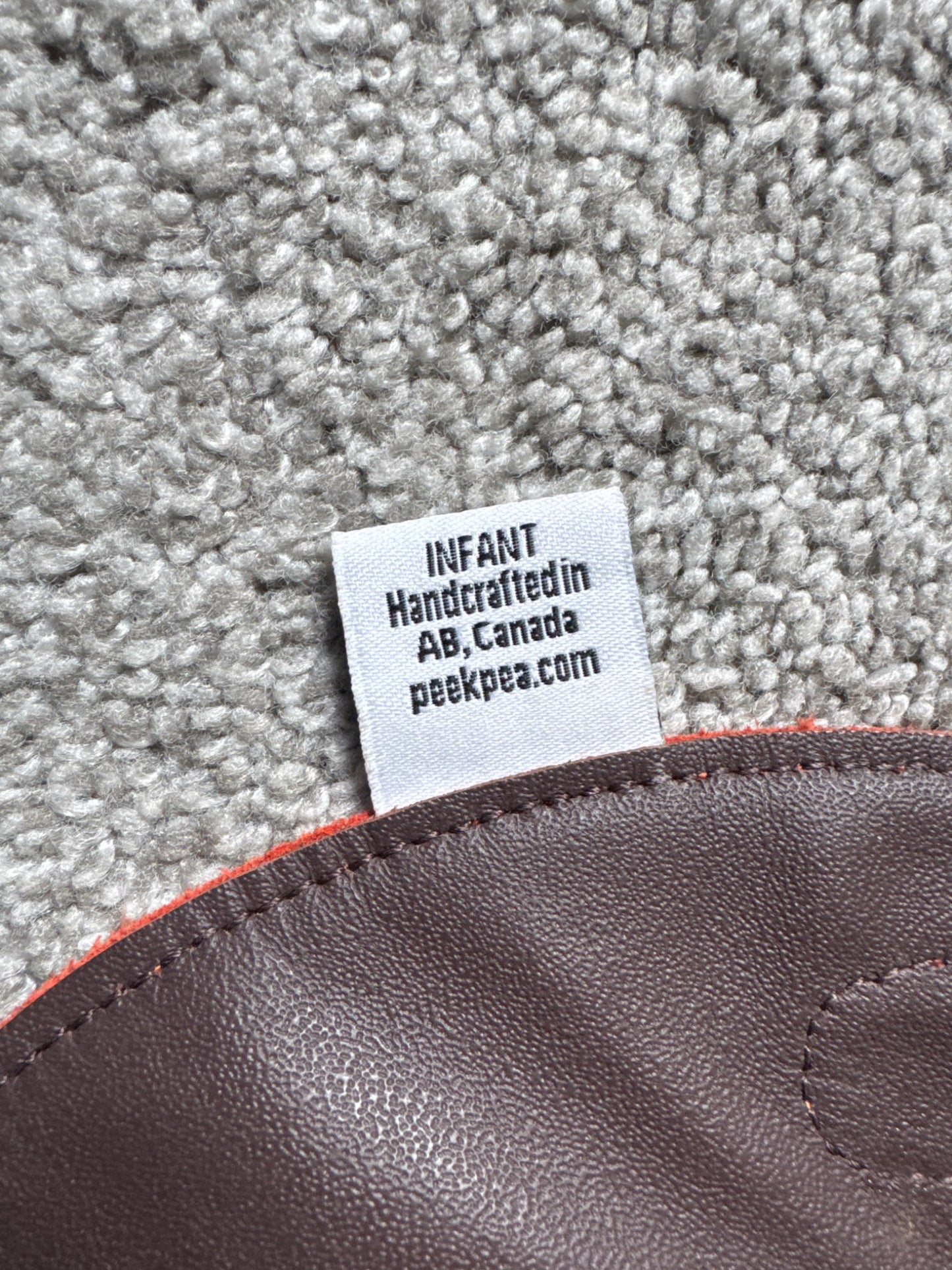 Peek pea leather bib