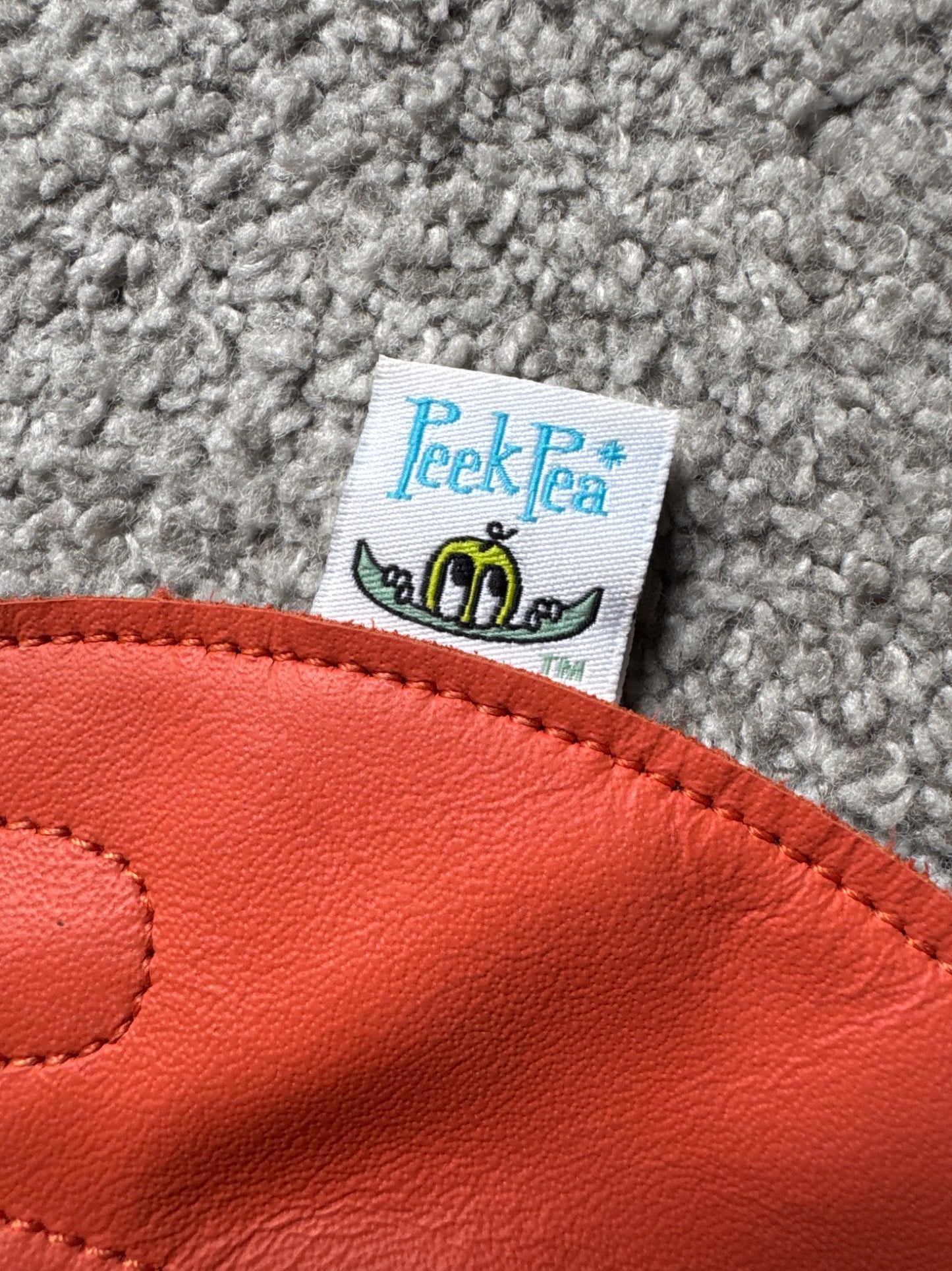 Peek pea leather bib