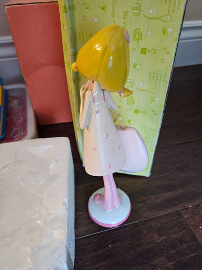 Whimsical Girl Figurine with Clock