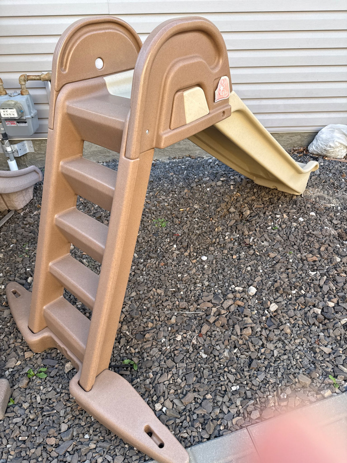 Tall climbing ladder and slide