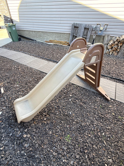 Tall climbing ladder and slide