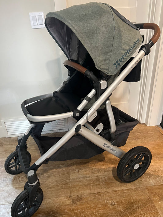 Uppababy Vista Stroller with Toddler Seat and accessories.