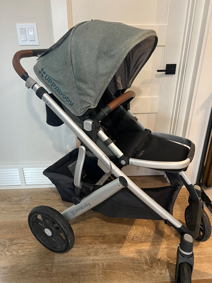 Uppababy Vista Stroller with Toddler Seat and accessories.