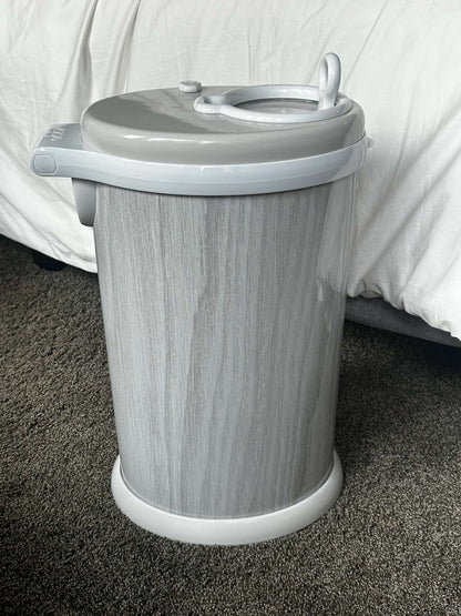 Ubbi steel diaper pail in grey woodgrain finish - Excellent condition!