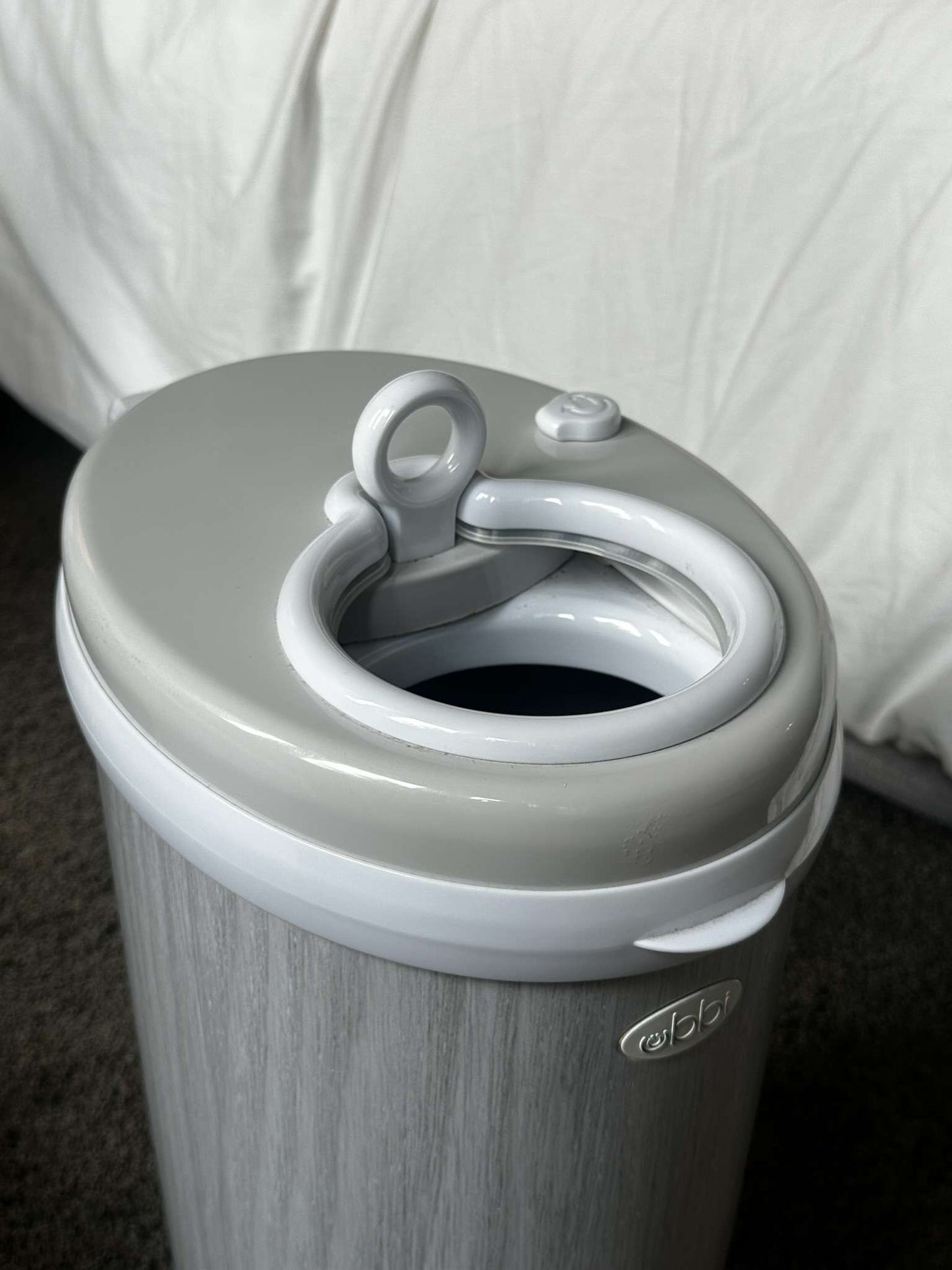 Ubbi steel diaper pail in grey woodgrain finish - Excellent condition!