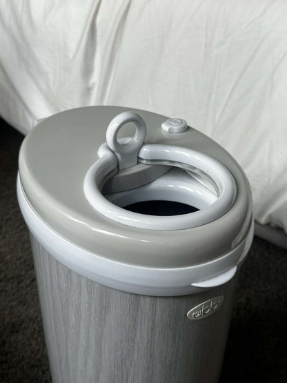 Ubbi steel diaper pail in grey woodgrain finish - Excellent condition!