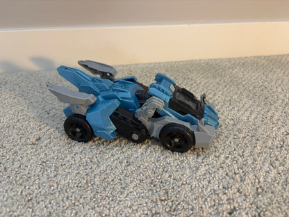 Transforming dinosaur/car