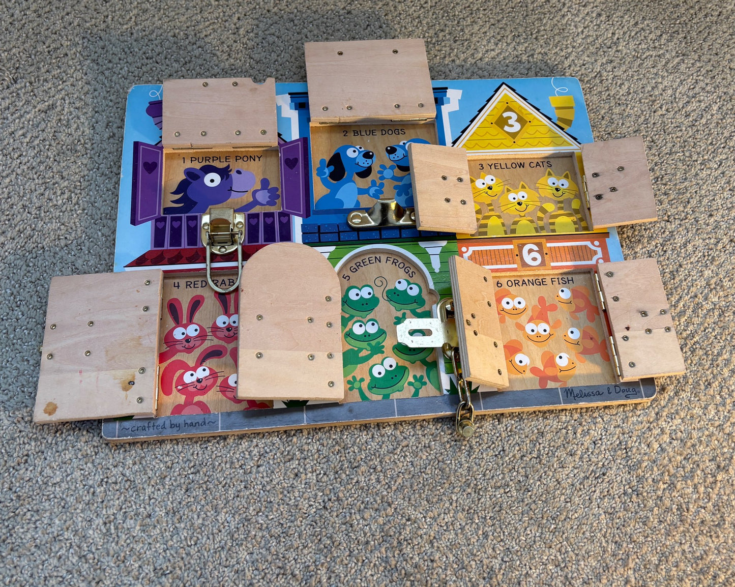 Melissa and Doug latches board