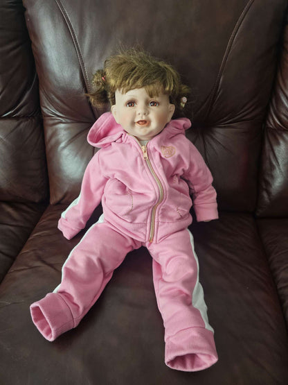 Porcelain Baby Doll in Pink Hooded Sweatsuit