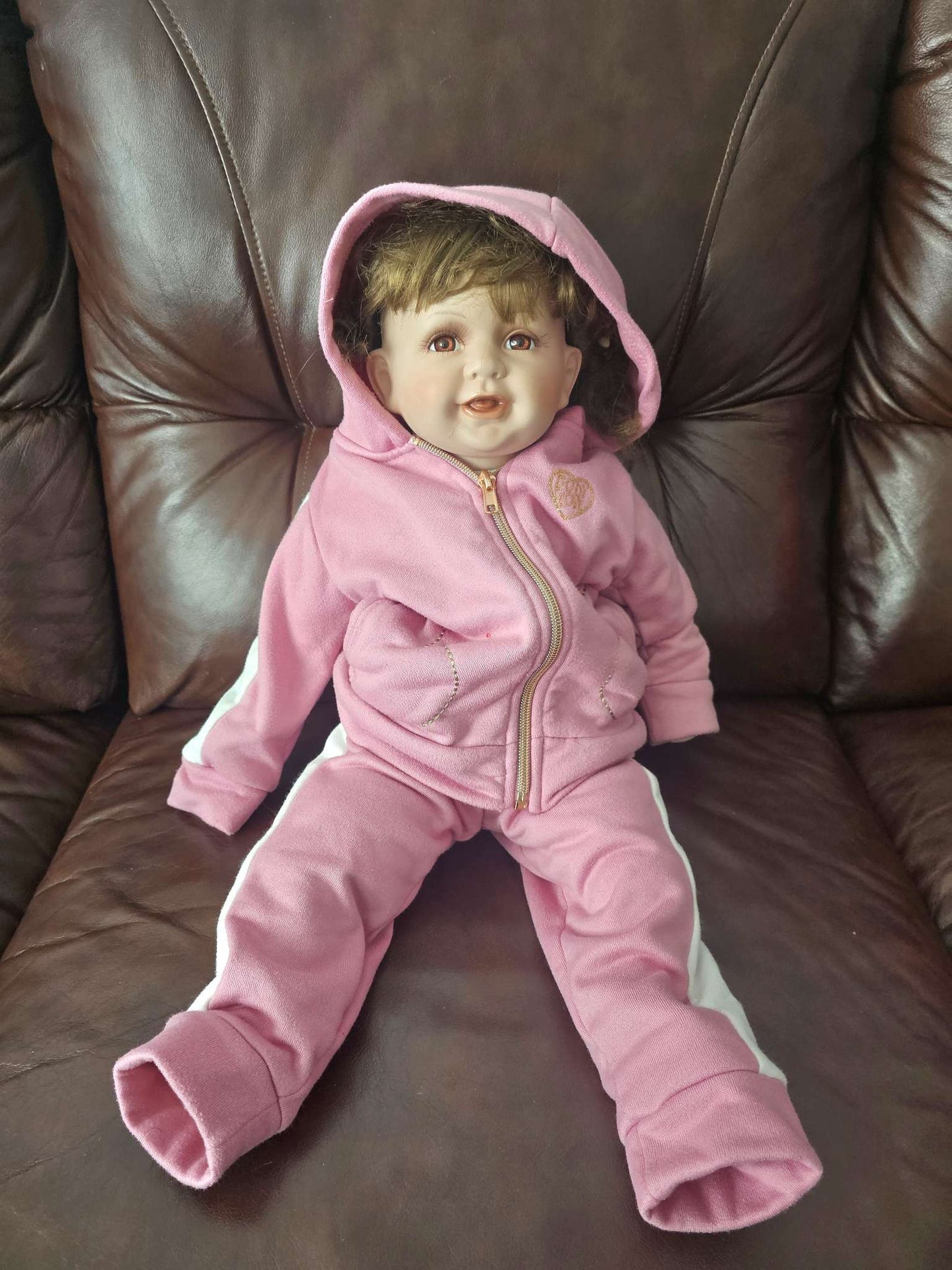 Porcelain Baby Doll in Pink Hooded Sweatsuit