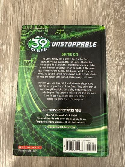 Two of the famous 39 Clues books The Maze of Bones and Nowhere to Run