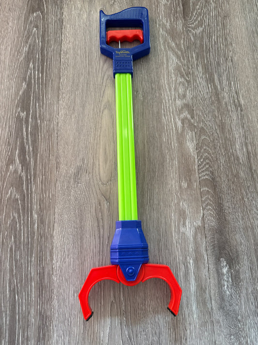 Grabbing toy advertisement two