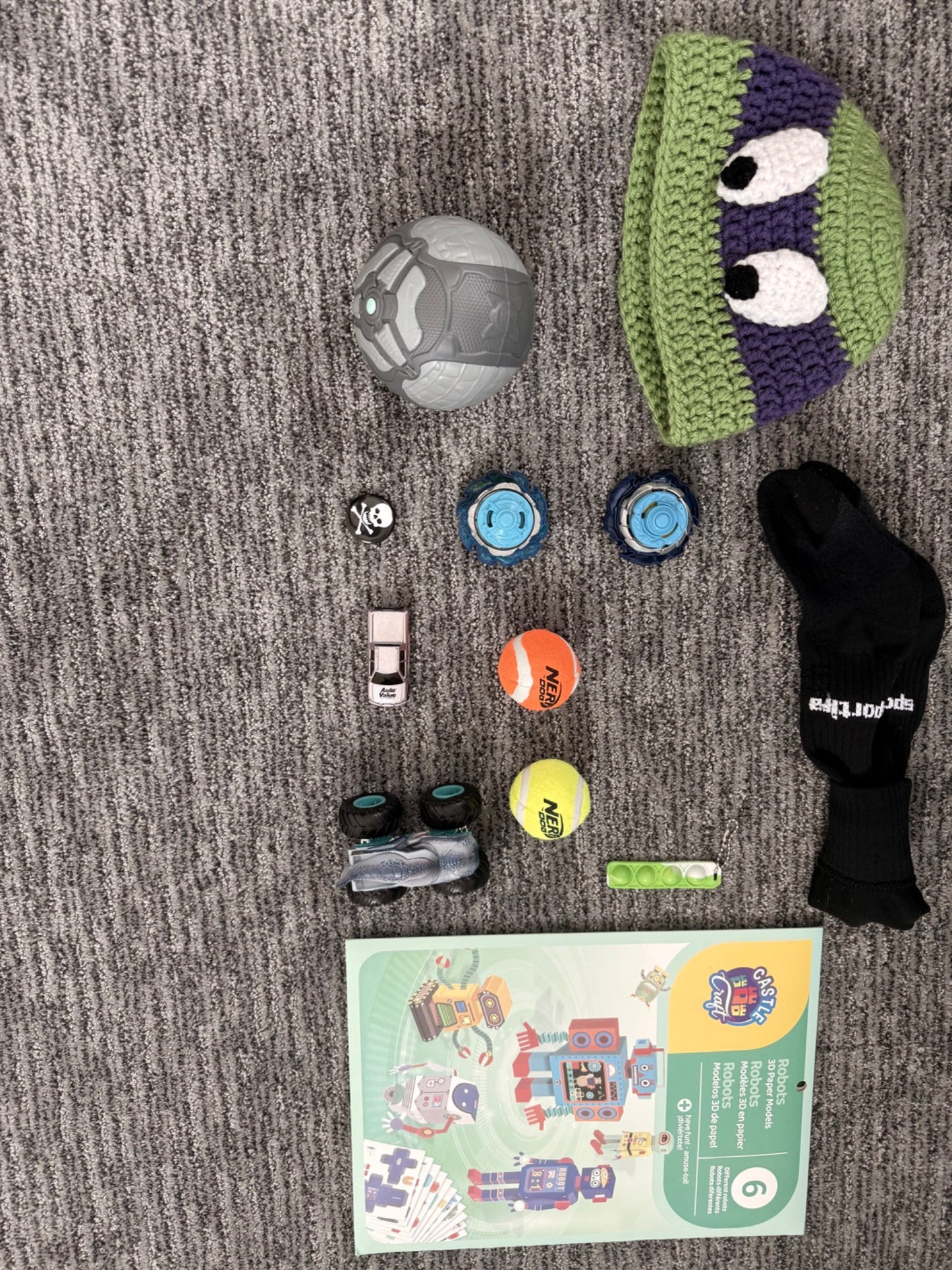 Boys assorted craft and toys set including Beyblades and Nerf Dog balls