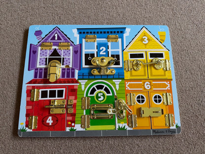 Melissa & Doug Latches Board