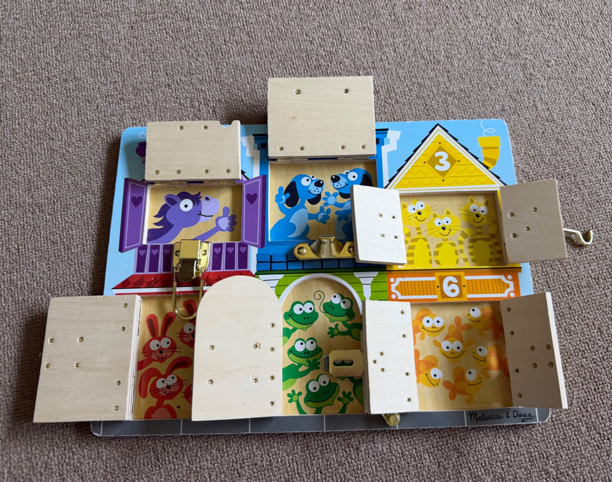 Melissa & Doug Latches Board