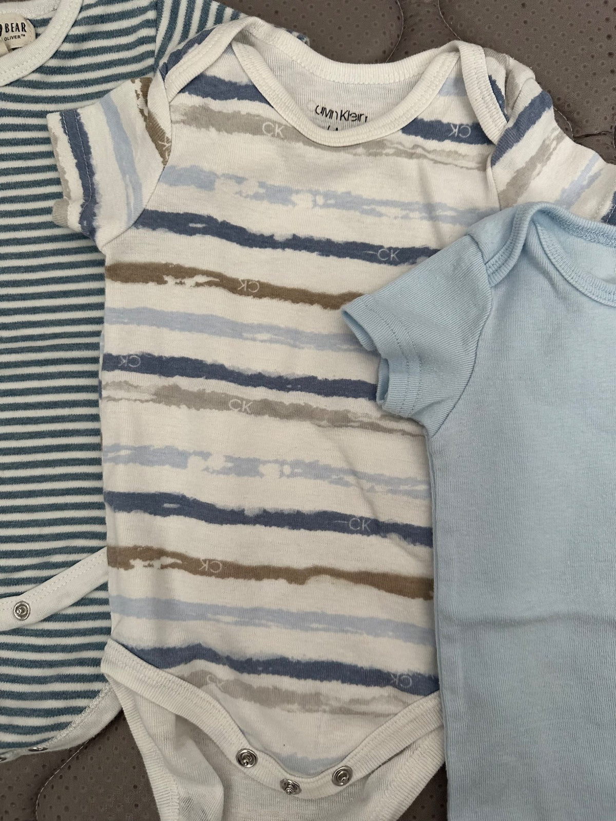 Bundle of 4 short sleeve onesies, Calvin Klein and other, Kids 9 Month (6-9M)