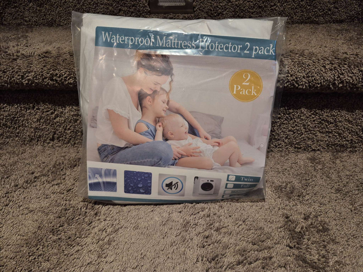 2-Pack Waterproof Mattress Protectors (1 New Twin + 1 Used Crib)