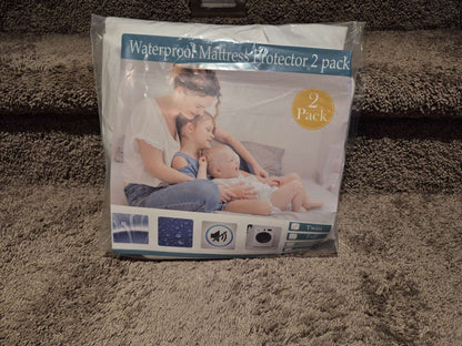 2-Pack Waterproof Mattress Protectors (1 New Twin + 1 Used Crib)