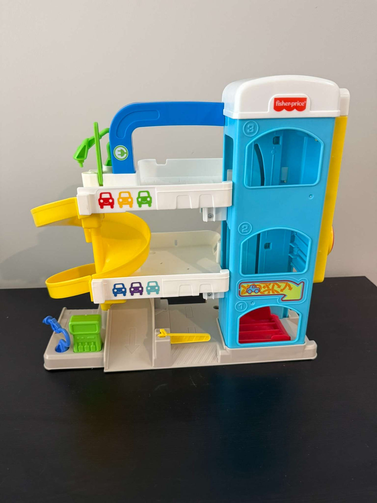 Fisher-Price Little People Helpful Neighbor's Garage with 11 Wheelie Vehicles