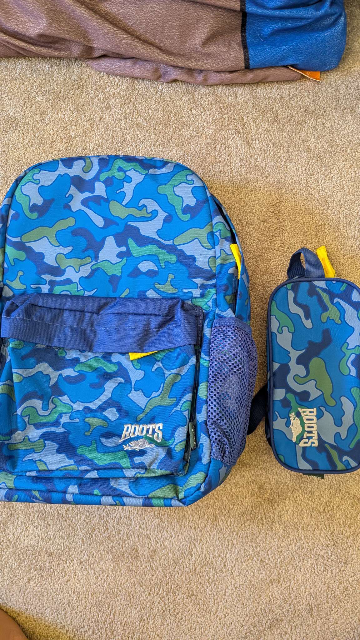 Roots backpack and matching pencil case