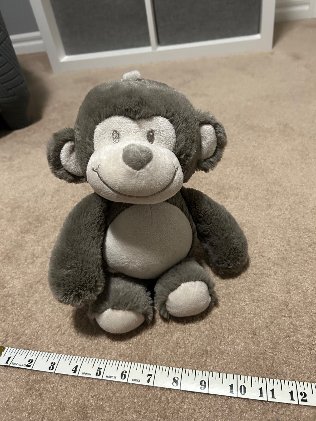 Musical pull toy monkey
