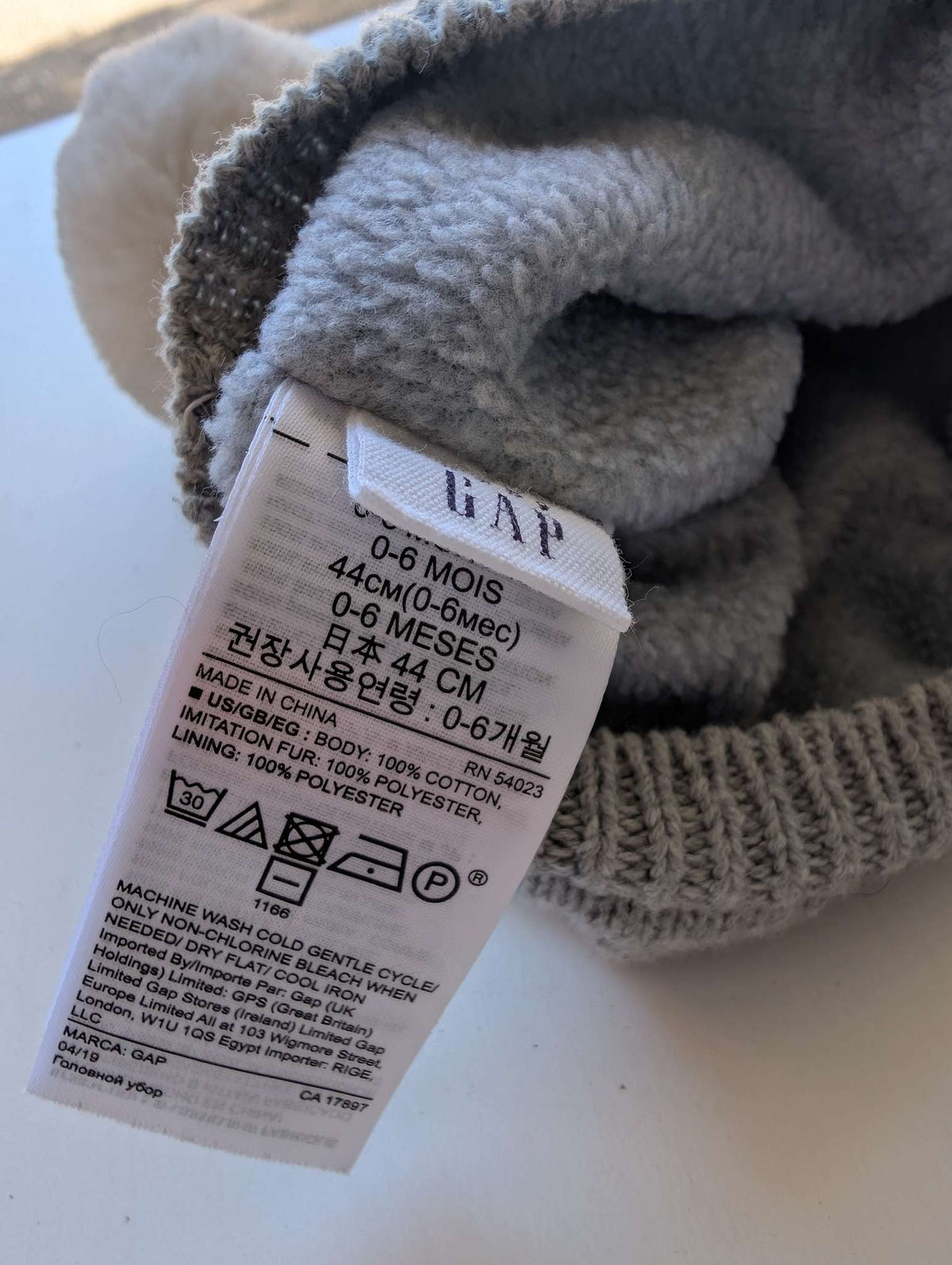 Baby Gap Fleece-Lined Knit Hat with Pom Pom & Ear Flaps (0-6M)