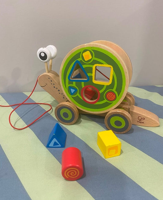 Hape Pull Along Snail MSRP: $40