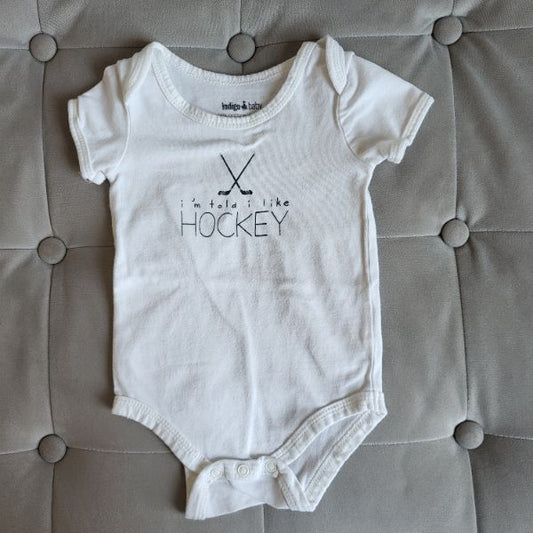 Indigo 3-6M I'm Told I Like Hockey Onesie