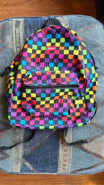 MineCraft-like. Brightly coloured backpack. Unisex. Barely used. Minimal flaws.