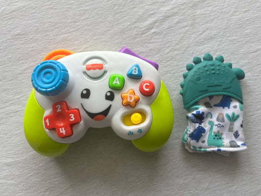 Baby Munch Mitt and Fisher Price Toy