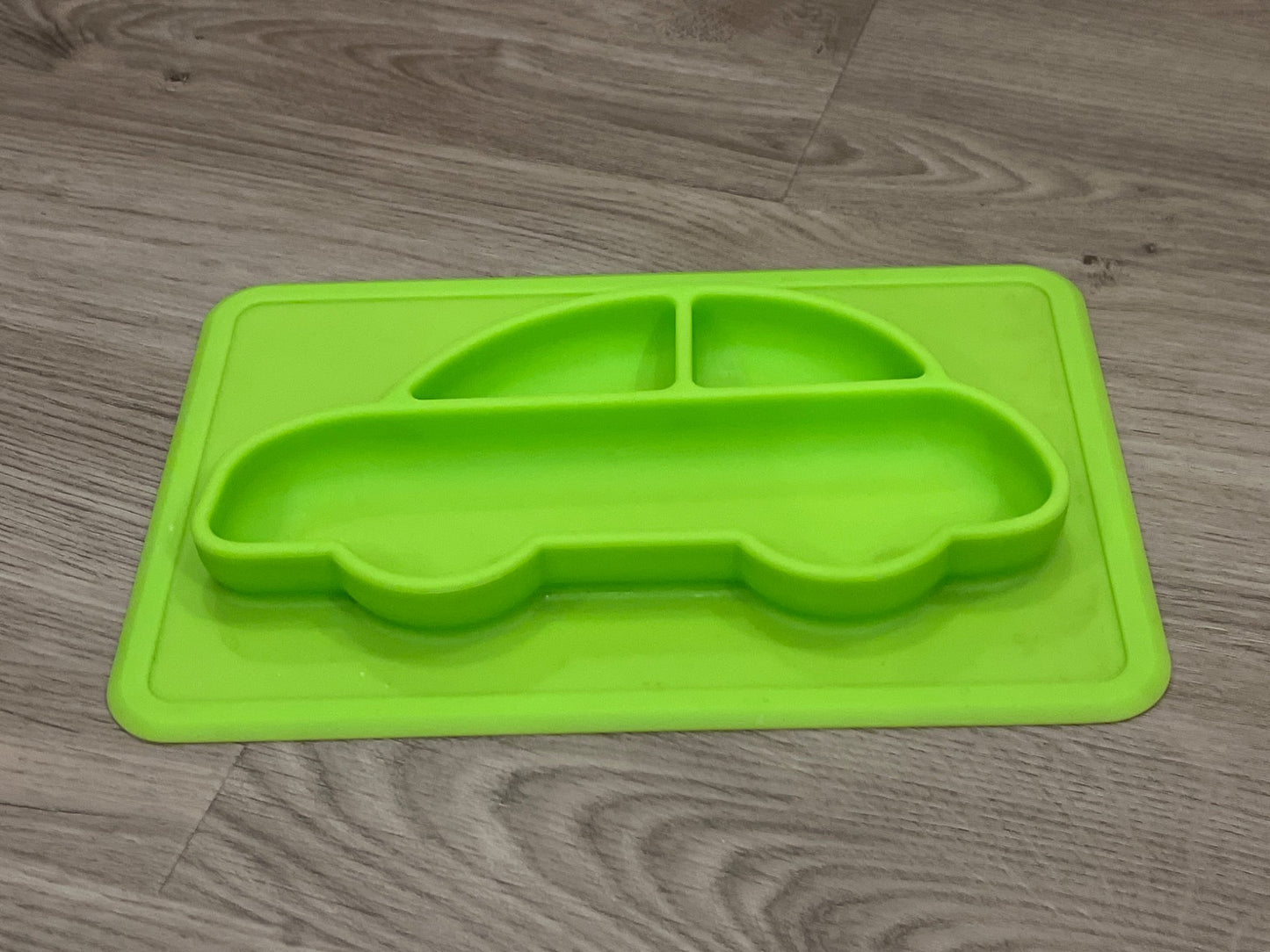 Feeding mat, green car, sticks to table, VGUC