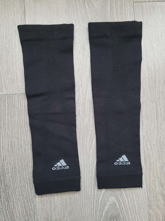 Pair of Adidas soccer shin pad covers