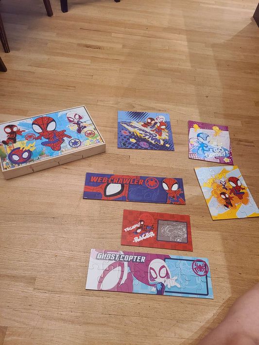 Wooden Spiderman puzzles.. 7 puzzles with case
