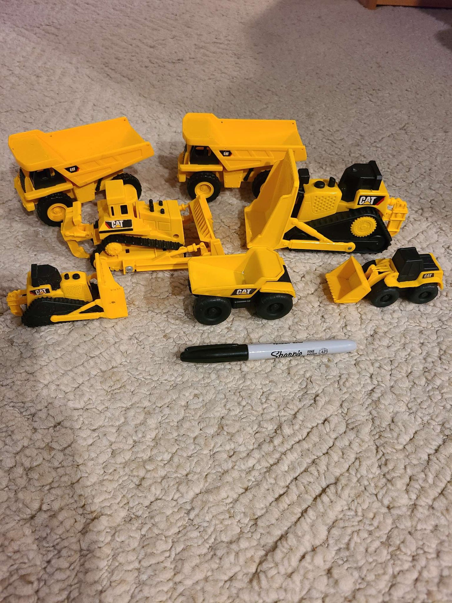 Assorted cat construction trucks