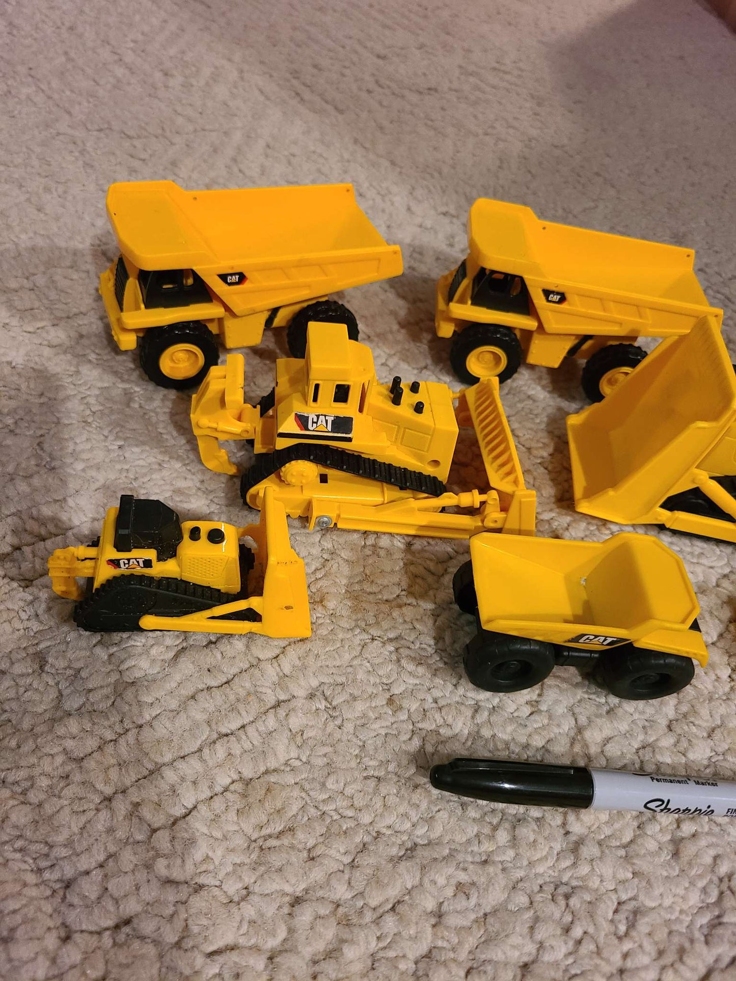Assorted cat construction trucks