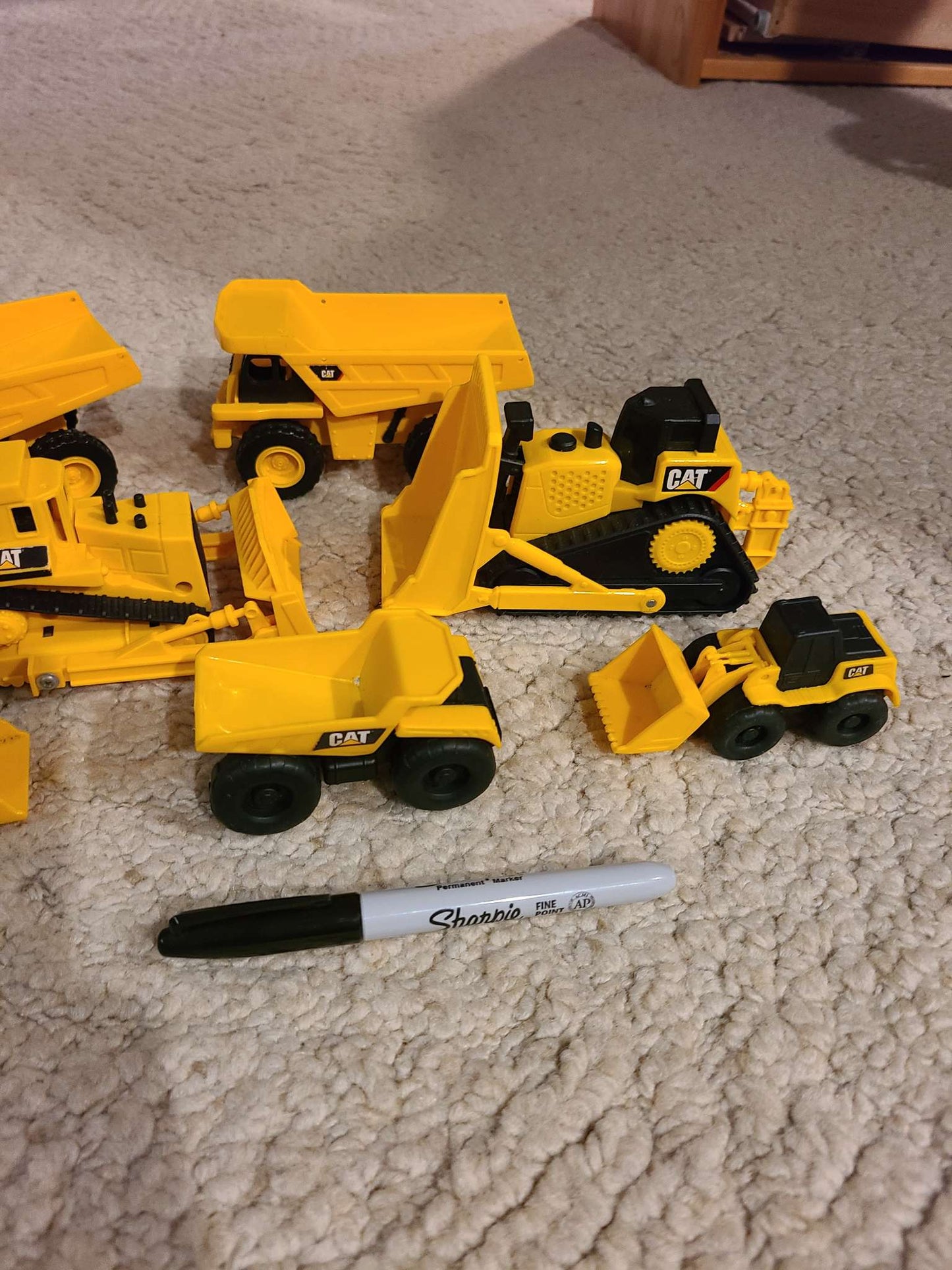 Assorted cat construction trucks