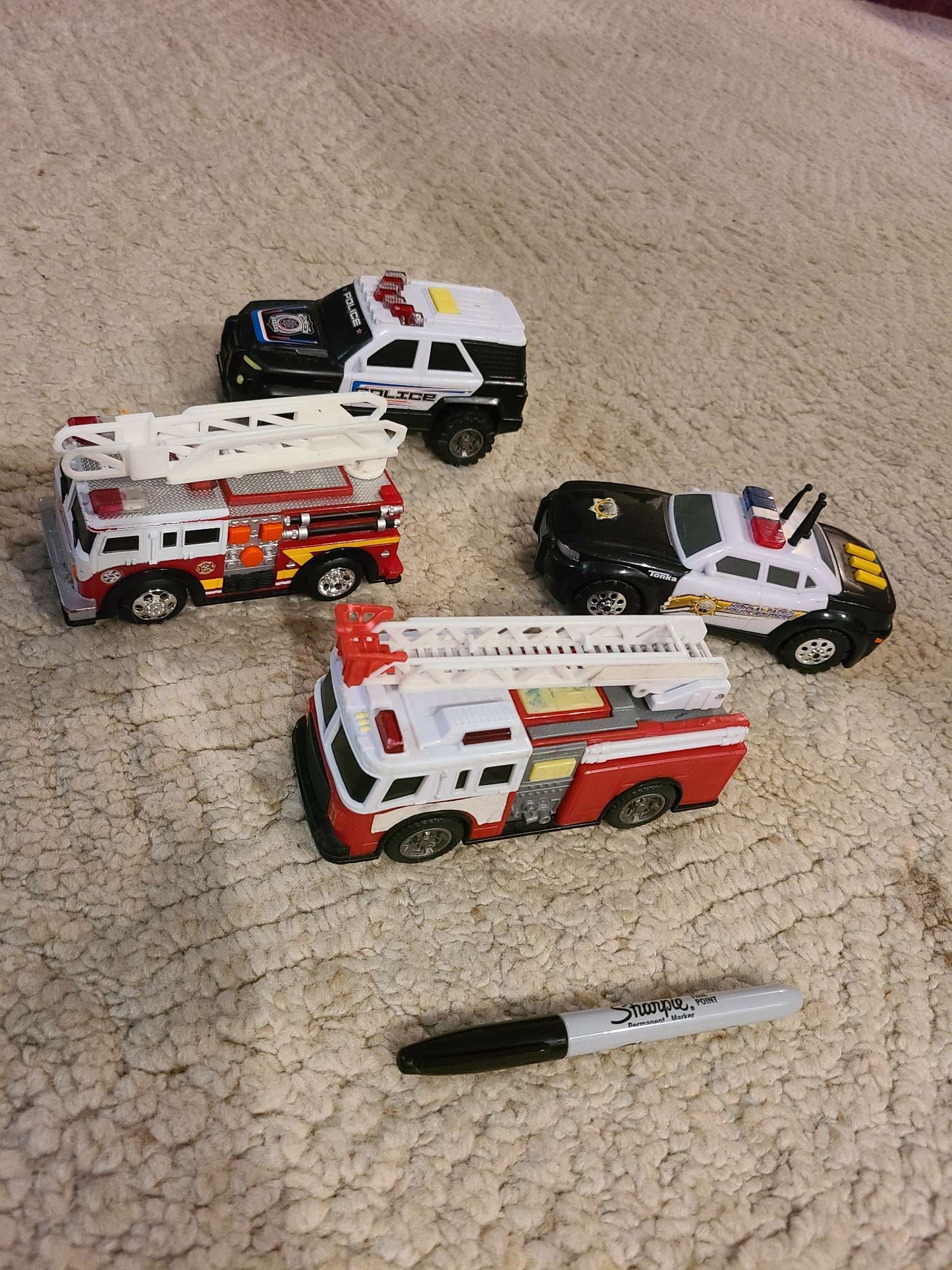 Assorted police and fire trucks