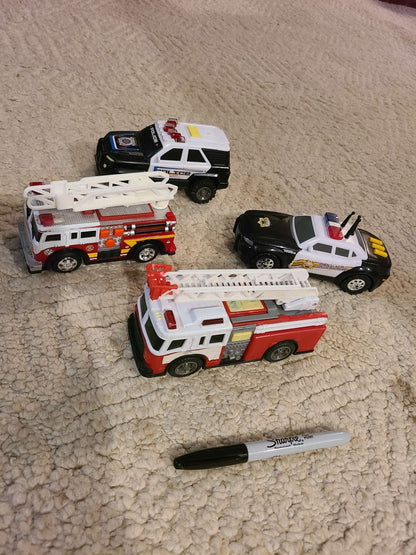 Assorted police and fire trucks