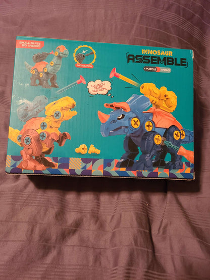 Dinosaur assembly puzzle and fight toy NWT