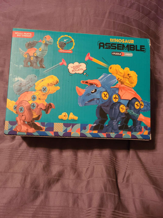 Dinosaur assembly puzzle and fight toy NWT
