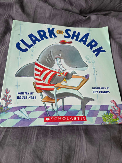 Scholastic books ( up, up down and Clark the shark)