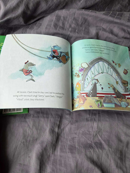 Scholastic books ( up, up down and Clark the shark)