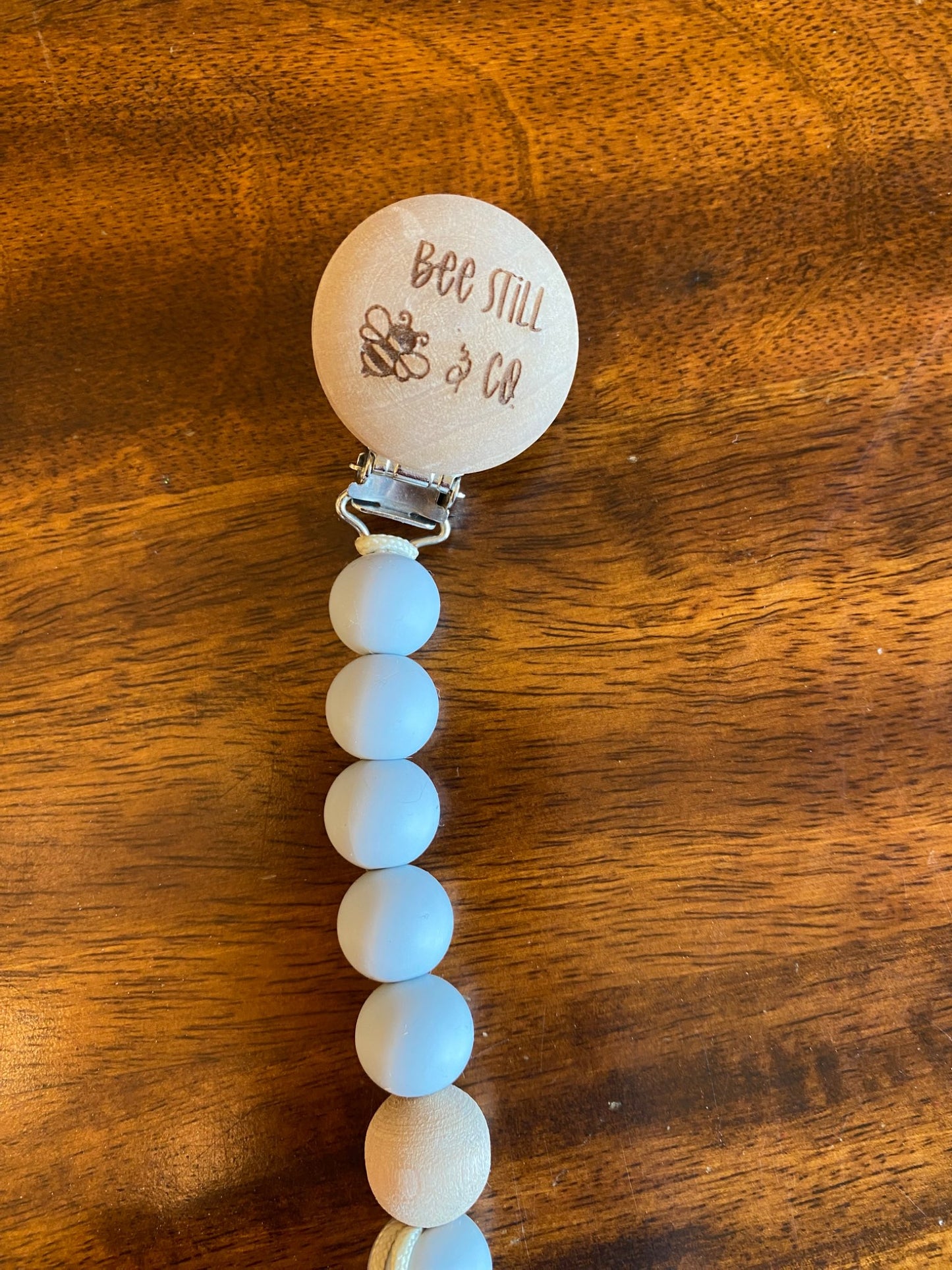 Unused silicone beaded clip, wooden teether