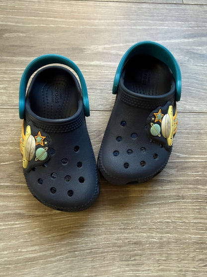 Light-up Space Crocs size 7; MSRP $54.99, Shoes 7 (Walkers:12-24 mth)